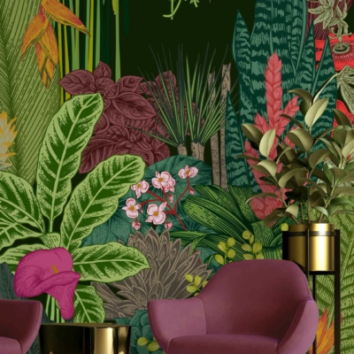 The wallpaper features colorful tropical plant illustrations with vibrant large green leaves, and flowers in striking shades of red, pink, and orange. This lively design captures the essence of Sweet Pea and Me's inspiration.