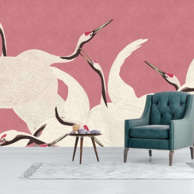The wallpaper features white cranes with red crowns and black tails against a pink background.