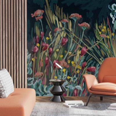 The wallpaper showcases a vibrant floral mural inspired by Fynbos and Pink Everlastings. It features an array of colorful blossoms in shades of pink, green foliage, and intricate botanical designs.