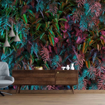 The wallpaper features lush, multicolored foliage in vibrant shades of green, blue, and purple, creating a botanical atmosphere reminiscent of 1999's eclectic style.