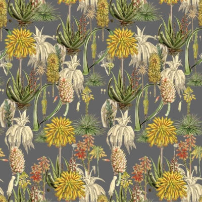 A detailed wallpaper pattern showcasing a variety of tropical plants and flowers. It includes blooming Aloe Vera, cacti, and yellow dandelion-like blossoms. The arrangement is dense against a grey background and features rich shades of green, yellow, and earthy tones.