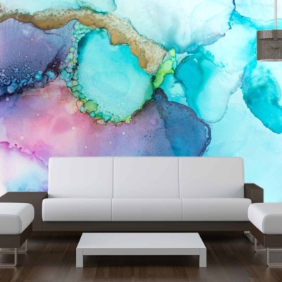 Vibrant watercolor mural with splashes of blue, teal, pink, and purple.