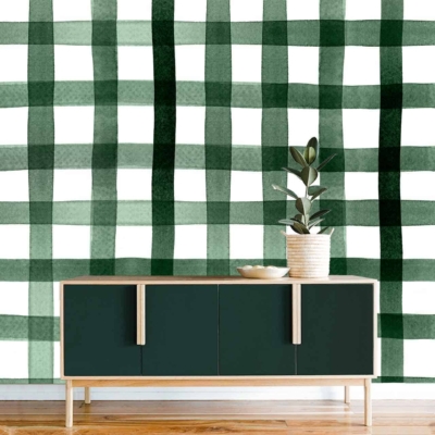 A minimalist interior features a **green and white checkered wall**, adding a vibrant yet balanced touch. The wallpaper's prominent elements include alternating **green squares** and **white squares**, creating a classic checkered pattern. This design emphasizes clean lines and simplicity, perfectly fitting the modern aesthetic while ensuring a timeless appeal.