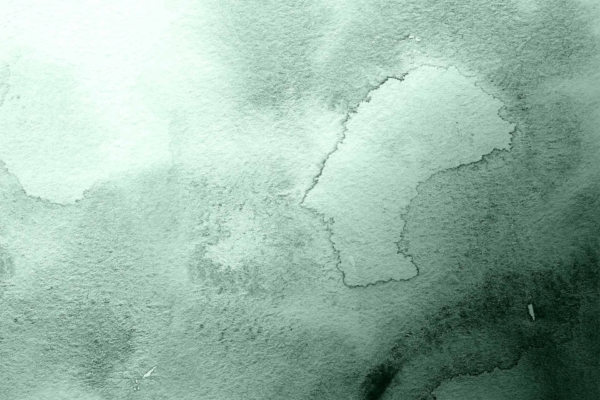 Green watercolor texture; varying shades of light and dark green; diffuse, abstract shapes; soft, organic pattern; foliage-like; water ripples resemblance; smooth, gradient edges.