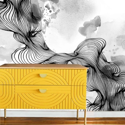 An artistic black and white abstract wall mural featuring swirling lines and watercolor textures.