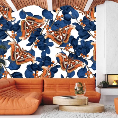 A vibrant mural with blue leaves, orange abstract shapes, and delicate butterflies.