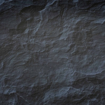 A close-up view of a dark, rough, and textured rock surface with thin white veins running across it. The weathered rock displays varying shades of gray with subtle highlights, creating a rugged pattern reminiscent of Black Widow's resilience. Elements: dark rock texture, white veins, varying gray shades.