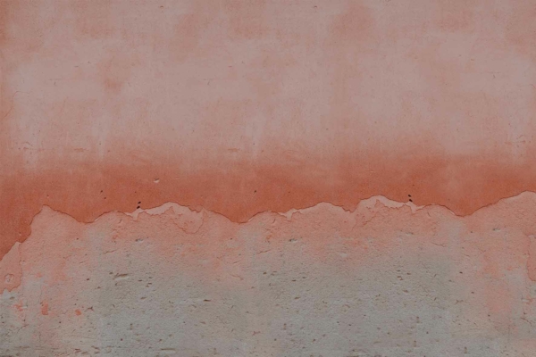 Rustic, textured wallpaper with a gradient from dark red to light pink, featuring weathered and peeled elements. Faded red at bottom transitioning to lighter pink at the top. Perfect for invoking a "Feeling Peachy" ambiance.