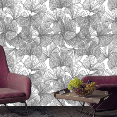 The wallpaper features a floral pattern with delicate ginkgo leaves. It showcases colors such as soft greens, yellows, and off-whites. The design is intricate, highlighting the natural elegance of ginkgo leaves.