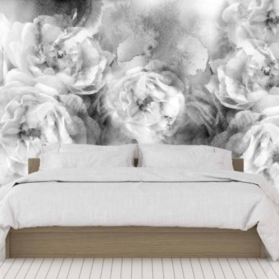 A grayscale floral mural on the bedroom wall features detailed flowers in varying shades of black, white, and gray. The intricate design includes large blooms and delicate petals, creating a striking contrast against the otherwise minimalist room decor.