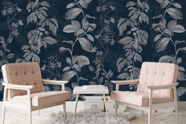Dark wall, large intricate monochrome leaf patterns, vine designs in black and white.