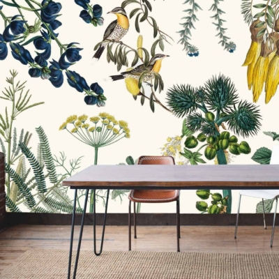 The wallpaper is a vibrant botanical mural inspired by Kruger National Park. It features colorful flowers, various species of birds, and lush green foliage. Key colors include bright reds, pinks, yellows, and different shades of green. Exotic patterns and detailed illustrations form an eye-catching design that brings nature indoors.