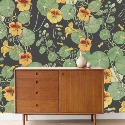 The wallpaper features large green leaves, yellow flowers, and winding vines in vibrant floral patterns.