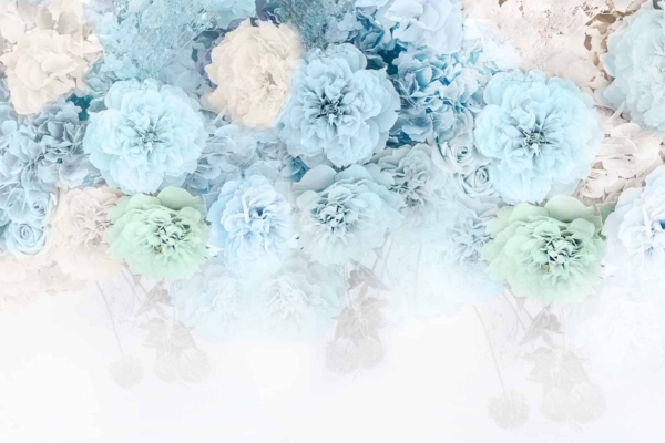 Pastel blue and green floral arrangement wallpaper, inspired by Nurse Betty's garden. Features densely packed flowers at the top, fading into a soft gradient towards the bottom. Dreamy and delicate design with key colors of pastel blue and green flowers.