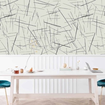 The wallpaper features an abstract pattern of intersecting black lines on a light background. It's minimalistic and modern, using the stark contrast of black against a muted, light backdrop to create a striking design element.