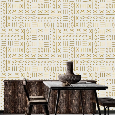 The wallpaper in the modern dining area features geometric shapes in gold on a white background. The design elements include various geometric patterns, sharply defined in metallic gold, contrasting elegantly against the crisp white backdrop. This contemporary and stylish wallpaper creates a striking visual impact with its clean lines and sophisticated color palette of gold and white.