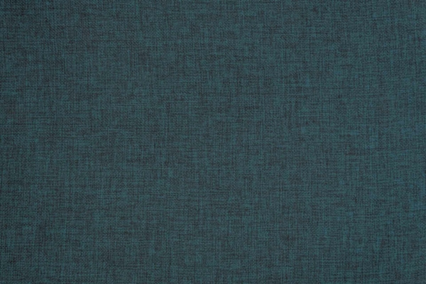 Close-up of textured fabric wallpaper in deep teal with a subtle woven pattern. The classic texture features slight shade variations, creating a rich and dynamic look. Key elements: textured fabric, deep teal color, woven pattern, shade variations.