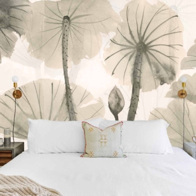 A bedroom wallpaper featuring large gray-green leaves. The mural highlights an intricate design with varying shades of gray and green, creating a lush, serene backdrop that adds depth and elegance to the room.
