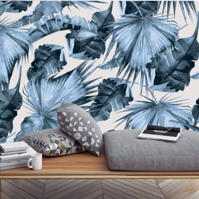 Bold wallpaper featuring large, abstract palm leaves in blue and green.