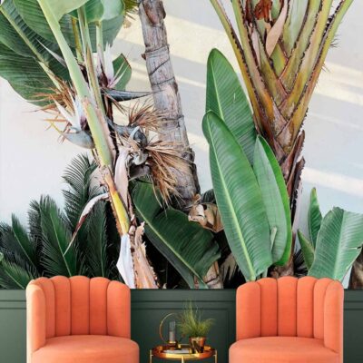 The wallpaper features a large, vibrant mural of tropical plants evoking a Balinese summer. Elements include lush green leaves, exotic flowers in vivid shades of red, orange, and yellow, intertwined vines, and possibly elements of water or sky in subtle blues.