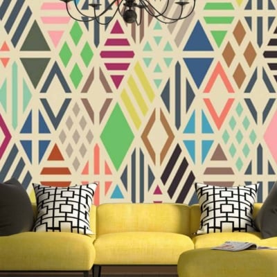 The wallpaper features a bold multicolored geometric pattern with vibrant hues like red, blue, yellow, green, and purple. The design includes sharp angles and intersecting shapes that evoke a futuristic Blade Runner-esque vibe.