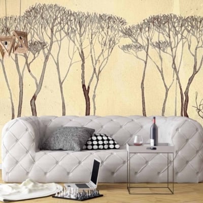 The wallpaper is an abstract forest mural featuring muted earth tones like mossy green, deep brown, and hints of golden sunlight. It includes silhouettes of trees and textured layers that add depth and a nature-inspired atmosphere to the room.