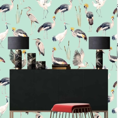 The wallpaper is light green with bird-themed designs featuring various cranes.