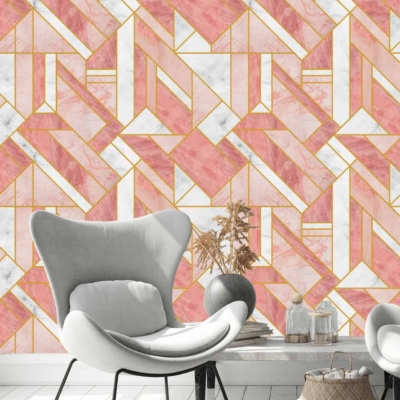 The wallpaper features a geometric pattern with pink and white hues, accented with gold highlights. The design is modern and adds a touch of elegance to the living space.