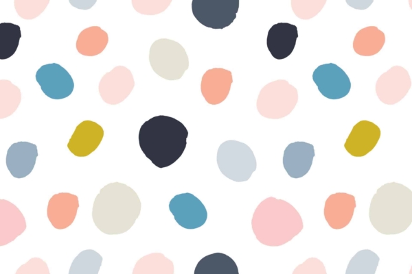 A wallpaper pattern featuring irregularly shaped pastel and dark-colored spots scattered across a white background. The spots come in varying sizes and include shades of pink, blue, grey, yellow, and black.