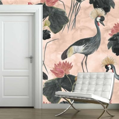 Wallpaper with crowned cranes, lotus flowers, and large leaves. Colors: shades of pink, green, and black.