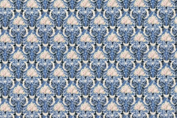 Intricate damasked wallpaper, blue and white design, symmetrical floral motifs, ornamental patterns, hints of pale pink accents on floral elements. Visually rich and detailed texture.