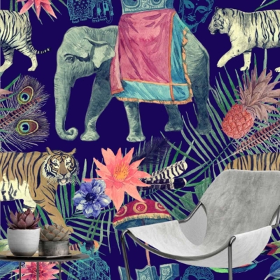 Vibrant, richly patterned wallpaper inspired by Delhi travels featuring:
- Elephant adorned with colorful fabric
- Tigers
- Tropical plants
- Peacocks
- Flowers
- Pineapple
- Intricate masks
Colors: Various bright hues including reds, blues, greens, yellows, and purples.
