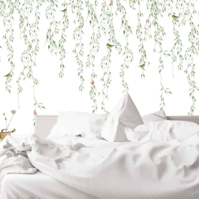 The wallpaper features a mural of hanging green leaves and small birds against a white background.