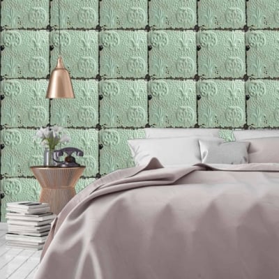 Dorothy's retro-inspired wallpaper in this cozy bedroom showcases a mint green color with an embossed tile pattern.