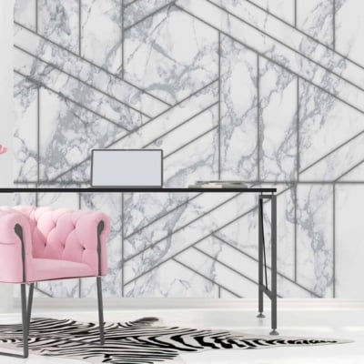 The wallpaper features abstract geometric patterns and shapes reminiscent of New York landmarks. It includes a mix of marble textures with white, gray, and black hues to create a sophisticated backdrop.