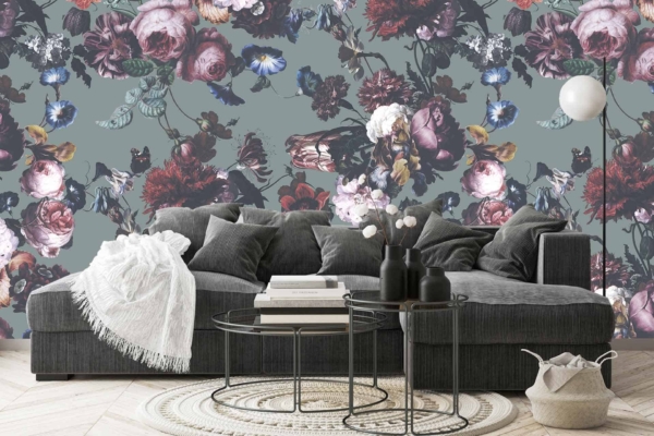 Vibrant floral wallpaper: shades of red, pink, and blue flowers on a green background.
