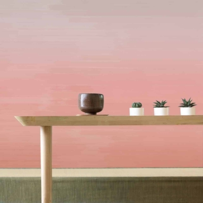 The wallpaper features a gradient of soft pinks and off-whites, creating a serene and elegant atmosphere.