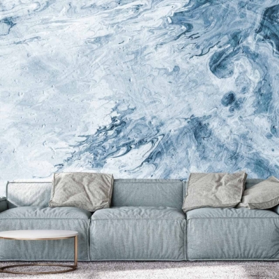 Abstract blue and white marble-patterned wall; striking design; swirling blues, whites, and subtle greys; modern and artistic look.