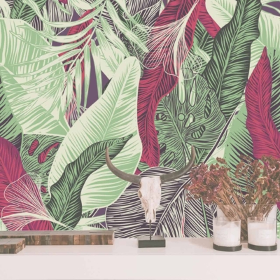 The wallpaper features a vibrant tropical leaf pattern in green, purple, and red hues. The design showcases lush foliage with a rich color palette, creating an island-inspired atmosphere.