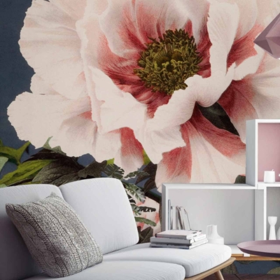 A large, detailed mural featuring a pink and white flower with a vibrant green center adorns the living room wall. The colors in the mural mirror those of 