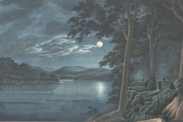 Wallpaper features a serene midnight landscape with a full moon illuminating a calm lake and river. Dense, dark trees and rolling hills surround the scene. Moonlight shimmers on the water, casting a tranquil glow. Colors include deep blues, blacks, soft silvers, and pale whites.