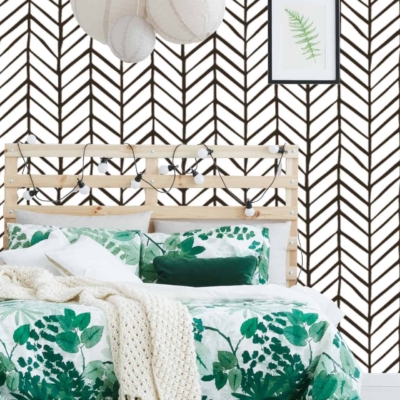 Black and white chevron pattern. Framed picture of a fern.
