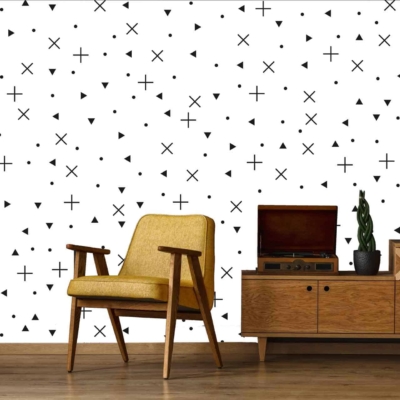 The wallpaper features a white background with a black scatter pattern, including elements reminiscent of Noughts and Crosses. The pattern consists of plus signs, triangles, and dots in an irregular arrangement. This bold but simple monochrome design makes the elements—plus signs, triangles, dots—stand out against the white backdrop.