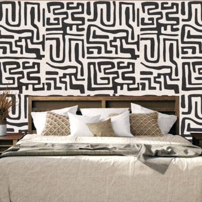 The wallpaper features a bold black and white abstract pattern, echoing the essence of 