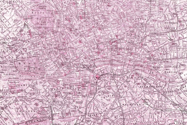 A vintage, detailed map wallpaper of central London in shades of pink and white. It features numerous labeled streets, landmarks, parks, and the River Thames winding through the city. Highlights include an intricate network of roads and railway lines rendered in varying hues of pink against a white background.