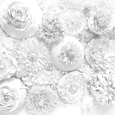 A monochromatic white wallpaper features intricately crafted paper flowers. The array includes various species with detailed petals and textures, creating a delicate and elegant composition. White background enhances the intricate floral details. Keywords: monochromatic, white, paper flowers, detailed petals, elegant composition.