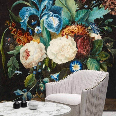 A vibrant, large-scale floral mural in bold colors with blue irises and white roses on a dark background. Elements include blue irises, white roses, and dark backdrop.
