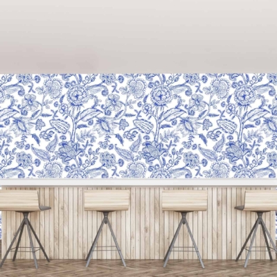 The wallpaper in the modern minimalist cafe in Robertson features intricate blue and white floral patterns.