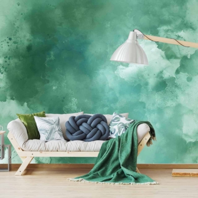 Green watercolor wall with varying shades and textures, evocative of