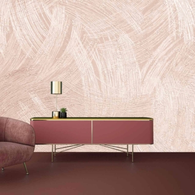 The wallpaper is textured and light pink, adding a contemporary touch to the space.